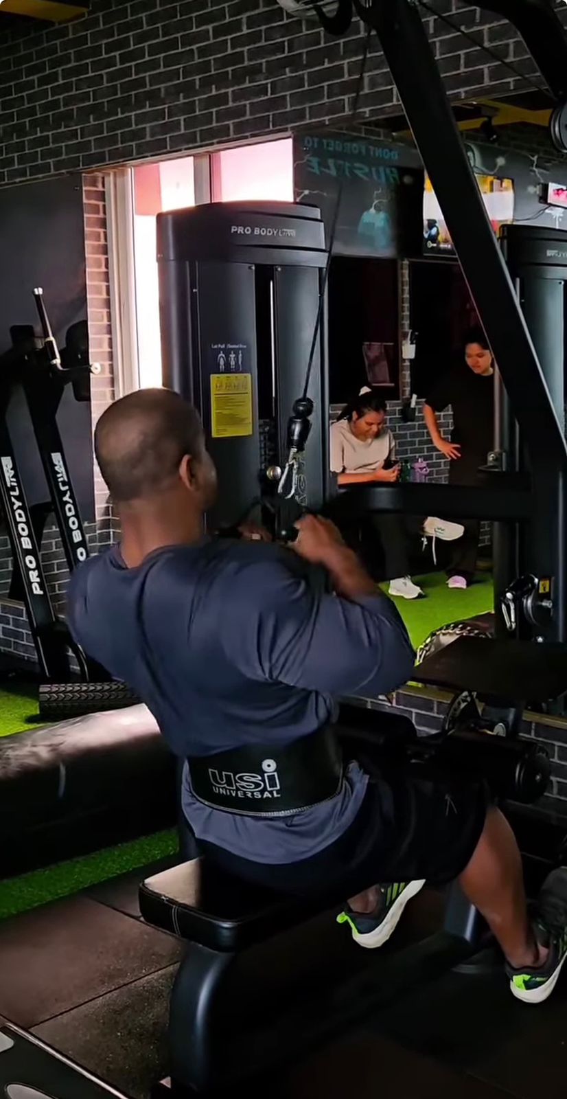 Seated cable row on the plate-loaded machine