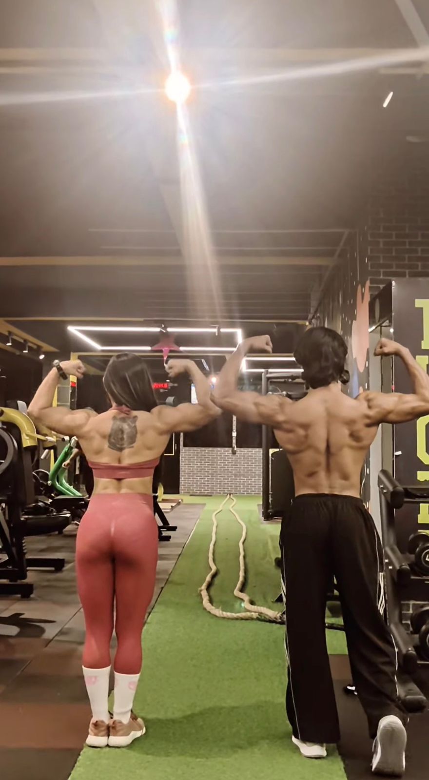 Members flexing back double biceps