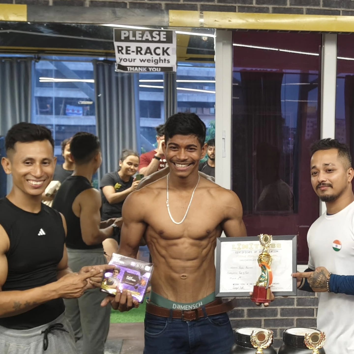 Coach with a bodybuilding contest winner